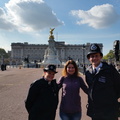 Chnatel with some Bobbies in front of Buckingham Palace