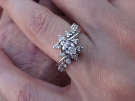 Closer view of her engagement ring