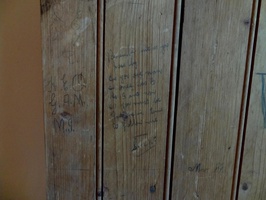 Inside the NG Church at Sutherland - Graffitti from English soldiers during the Anglo-Boer Waron Clock Tower door