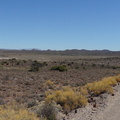 Panorama view of the Karoo with the road winding its way into the distance_180