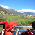 Entering Hout Bay we can see Chapman's Peak Drive in the background