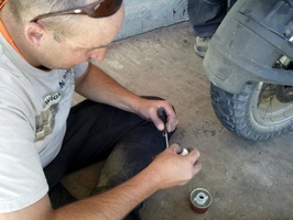 Puncture 05 - Shaun is applying the bonding mixture to the plug