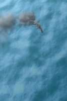 Battleship  on iPhone - Animated view of round streaking off into open water
