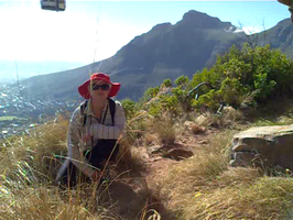 Chantel with Table Mountain Cable Car passing (Video)