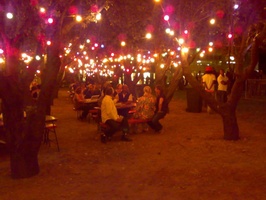 Outdoor tables under the lights at Jazz Festival