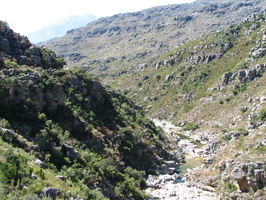 Bain's Kloof - Distant view of rock overhang and the river below