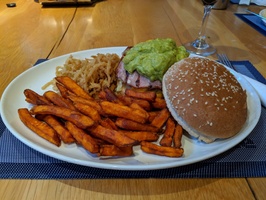 A bacon, cheese and guacomole burger with sweet potato friesd at the Spur