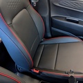 Artificial leather with red trim