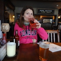 Chantel enjoying a drink at the Prospect of Whitby riverside pub