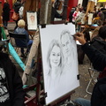 Having our portrait done at Montmarte