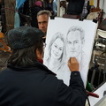 Having our portrait done at Montmarte
