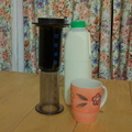 AeroPress brewing the coffee with fresh farm milk from Kromrivier
