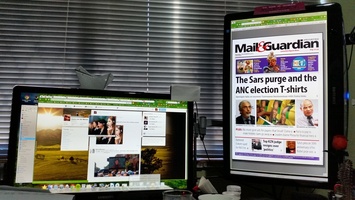 Using a portrait monitor setup now to read my newspaper
