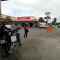 Filling up in Oudtshoorn with Trunell's Supermarket in the background