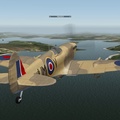 Spitfire flying over England