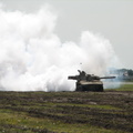 Rooikat laying down smokescreen on battlefield
