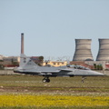 Gripen Fighter taxying in with Cooling Towers in background
