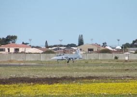 South Africa's Gripen Fighter in the distance readying for takeoff