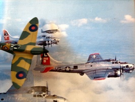 Spitfire passing B-17's