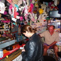 Chantel examining the geocache's logbook at Ronnie's Sex Shop