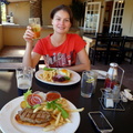 Chantel about to enjoy a Classic Dagwood Burger at The River Club