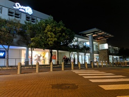 Night shot viewe of exterior of Howard Centre and the Cincinnatti Spur in Pinelands