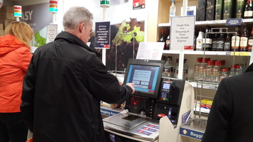 Paying for items at Tesco The Strand Express